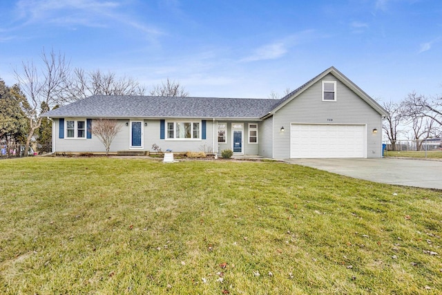 single story home with a front yard and a garage