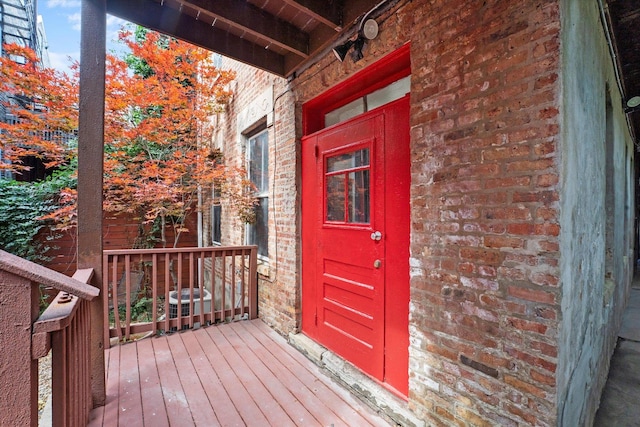 doorway to property featuring covered porch