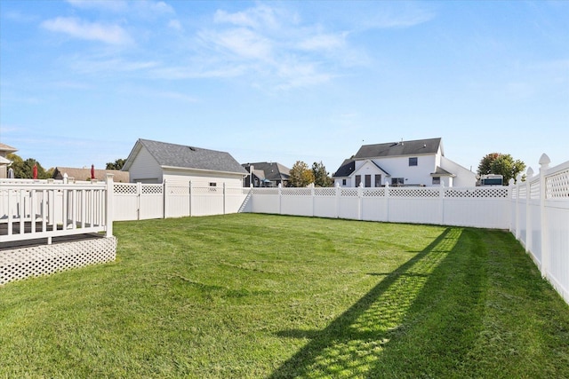 view of yard featuring a wooden deck