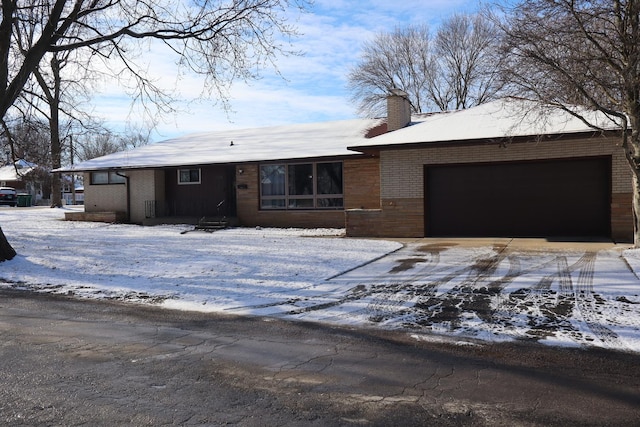 ranch-style home with a garage