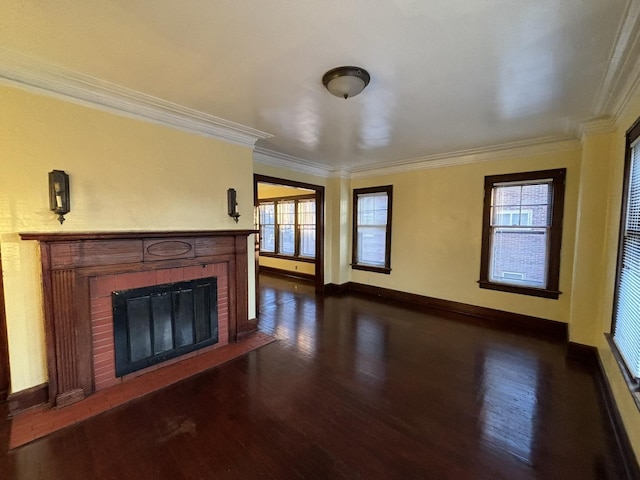 unfurnished living room featuring dark hardwood / wood-style floors, ornamental molding, and a fireplace