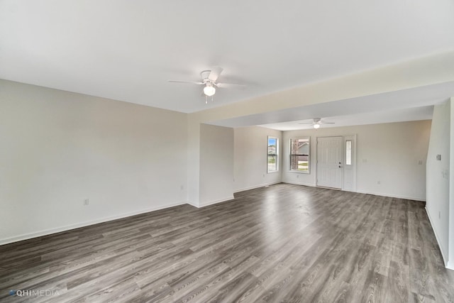 interior space with hardwood / wood-style floors and ceiling fan