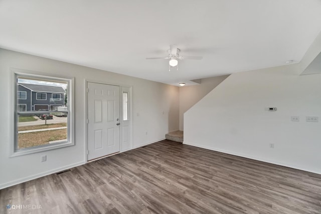 entrance foyer with ceiling fan and dark hardwood / wood-style floors