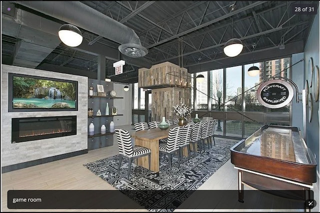 dining area with hardwood / wood-style flooring