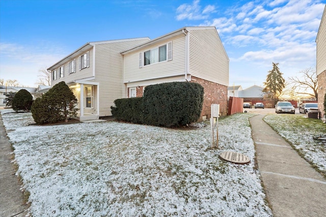 view of snow covered property