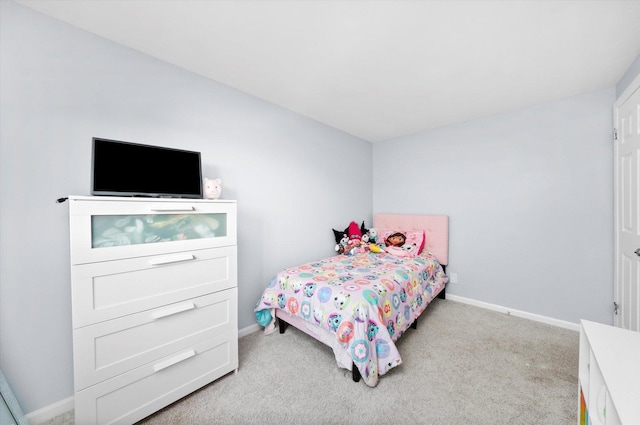 bedroom with light colored carpet