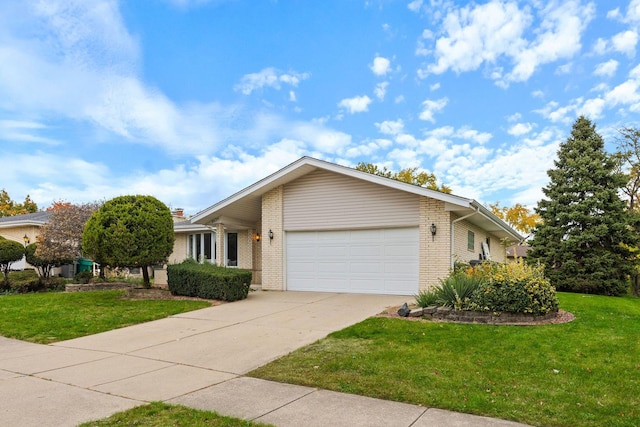 single story home featuring a front lawn and a garage