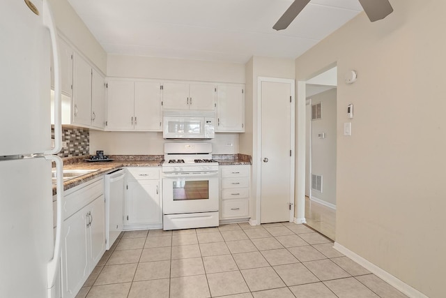 kitchen with ceiling fan, light tile patterned floors, white cabinets, and white appliances