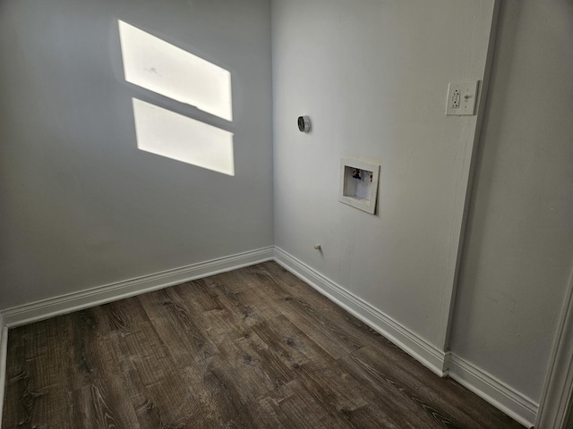 clothes washing area featuring dark hardwood / wood-style flooring and hookup for a washing machine