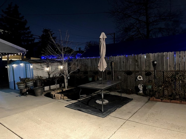 view of patio at twilight