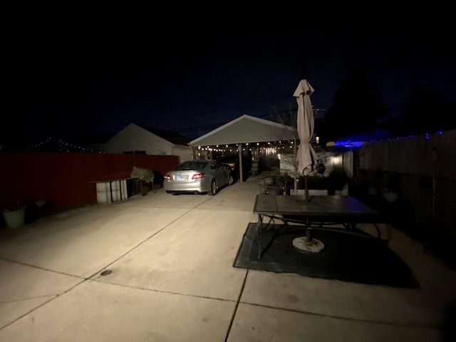 patio at night with a carport