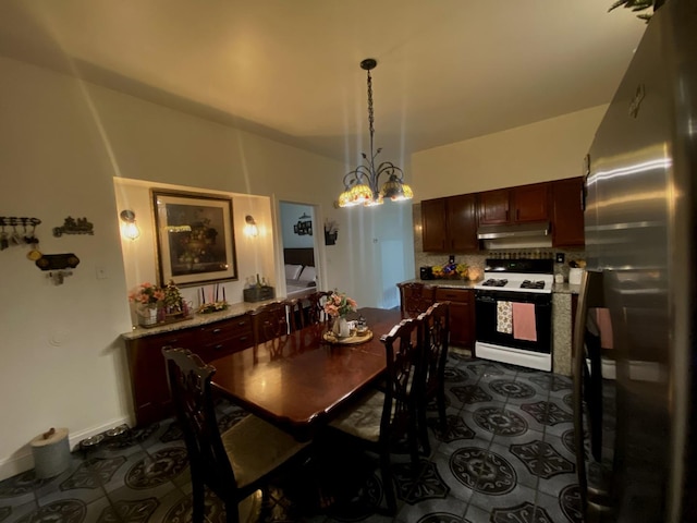 dining room featuring a chandelier