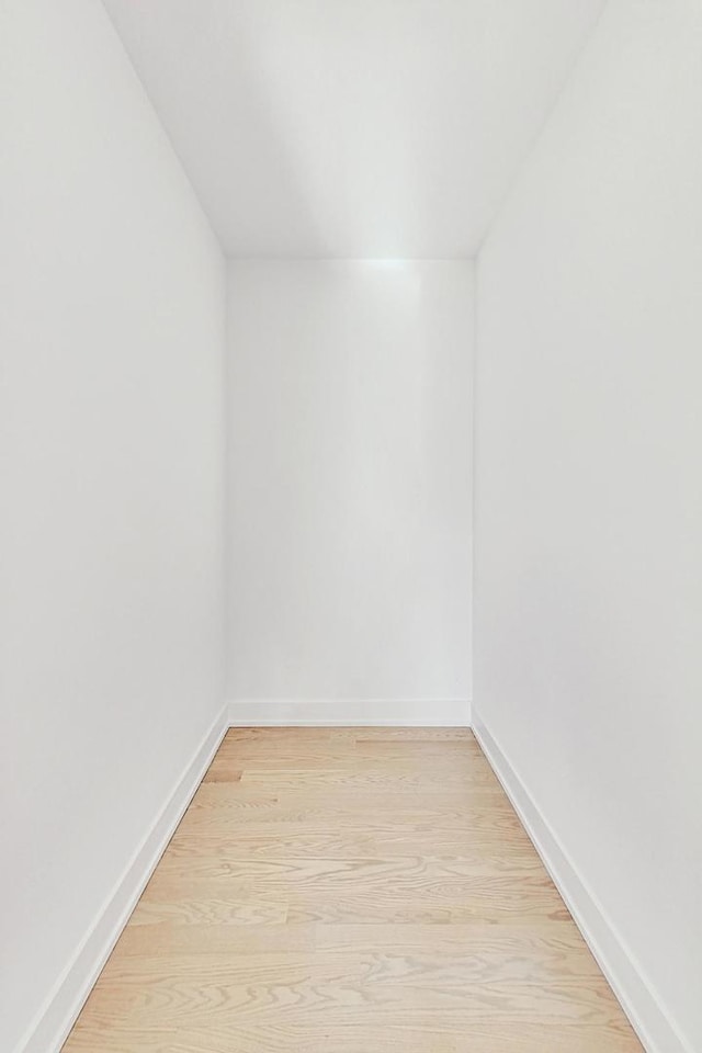 unfurnished room with light hardwood / wood-style flooring