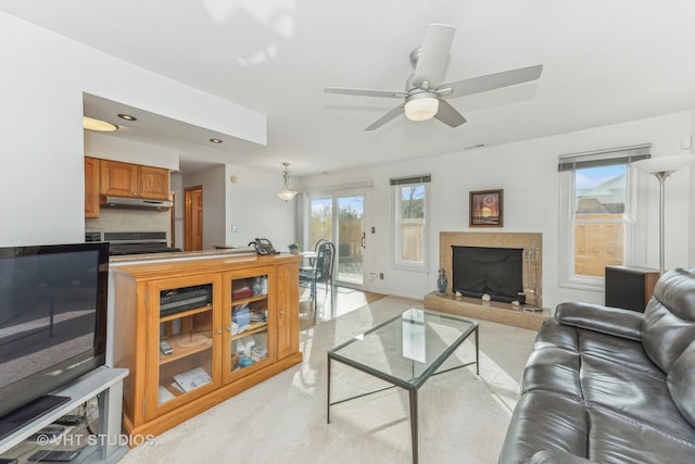 living room featuring ceiling fan