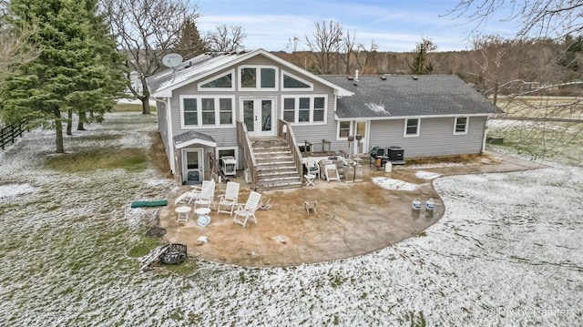 back of house with a patio