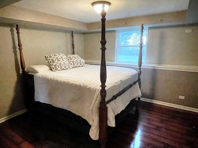 bedroom featuring wood-type flooring