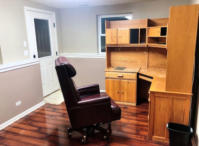 office with dark hardwood / wood-style floors