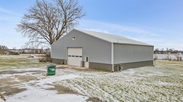 view of snow covered garage