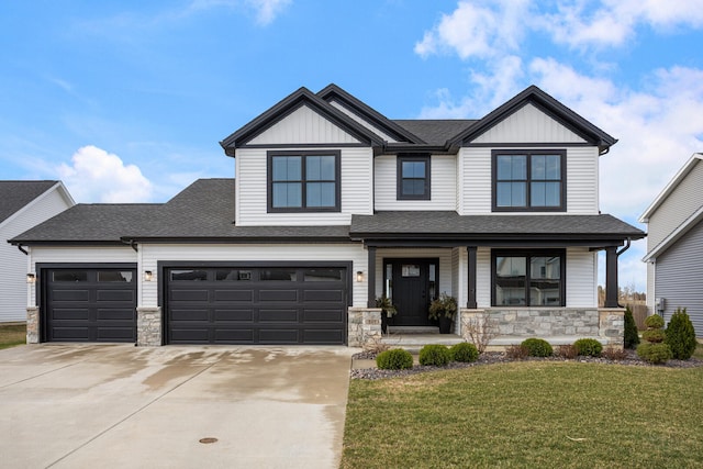 507 Wheatley Dr, Mahomet, IL 61853 - view of front of home with driveway, a front yard, covered porch, and stone siding