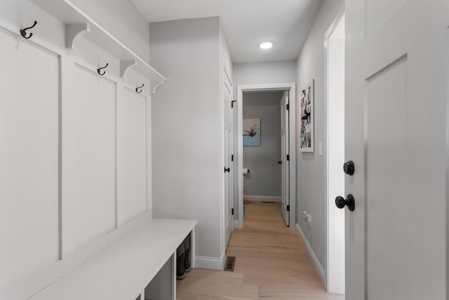 mudroom with light wood-type flooring