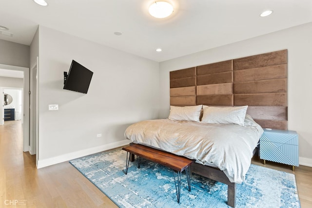 bedroom featuring hardwood / wood-style flooring