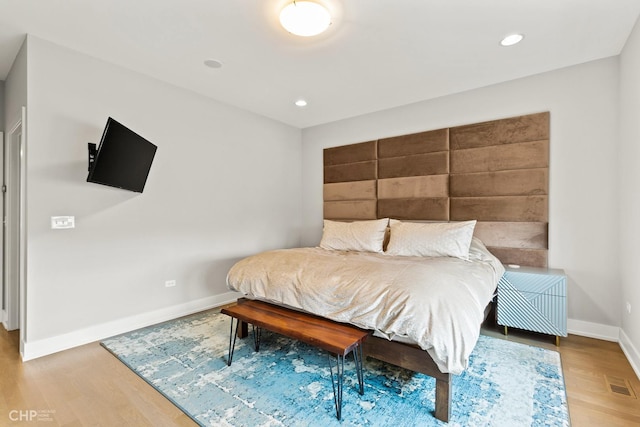 bedroom featuring hardwood / wood-style floors