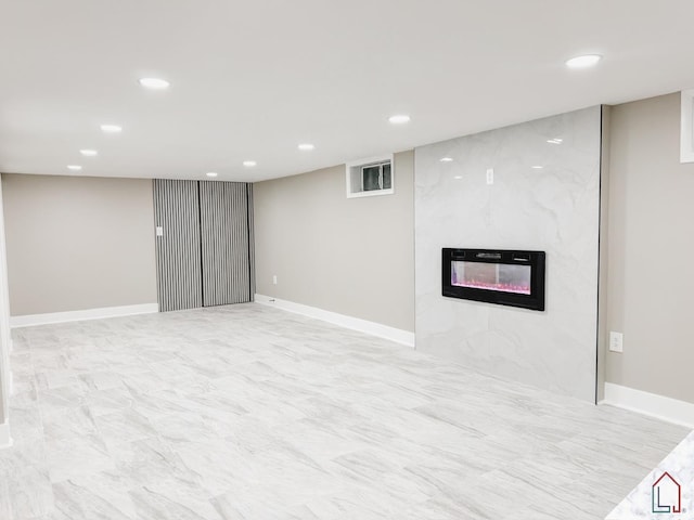 basement featuring a fireplace