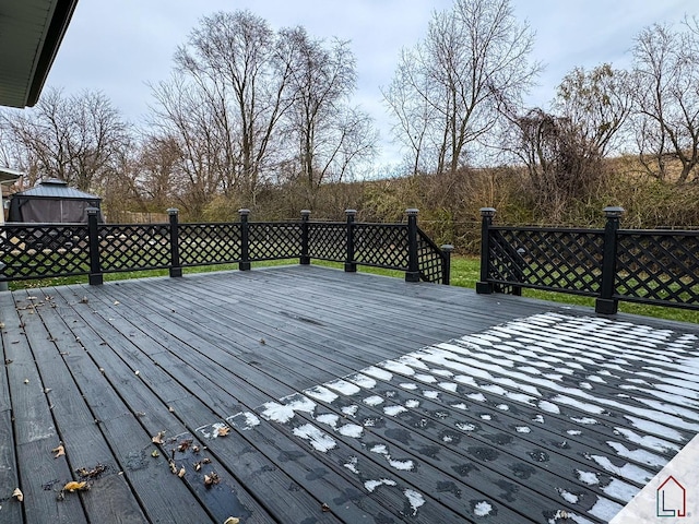 wooden terrace with a gazebo