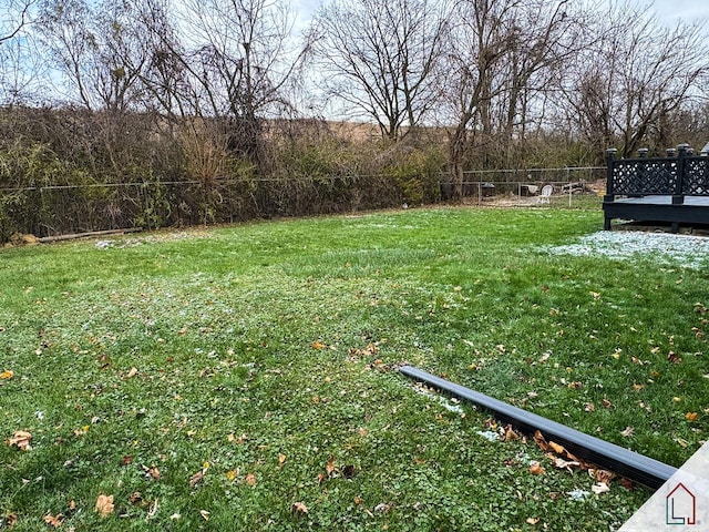 view of yard featuring a wooden deck