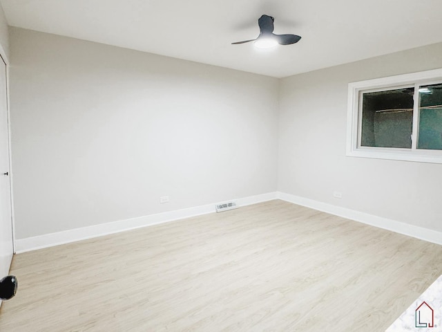 unfurnished room featuring ceiling fan and light hardwood / wood-style floors