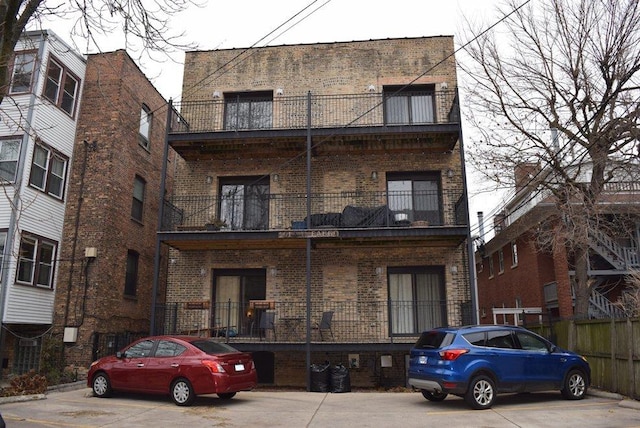 view of front of home with a balcony