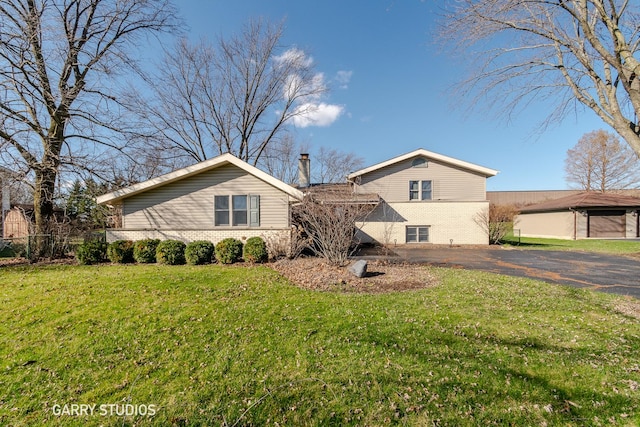 view of front of home with a front yard