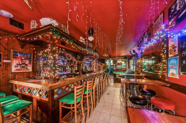 bar with tile patterned floors