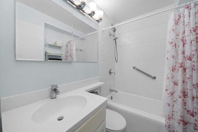 full bathroom with shower / bath combination with curtain, vanity, and toilet