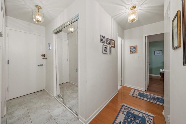 corridor featuring light hardwood / wood-style flooring