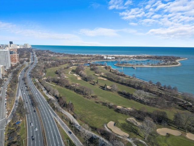 drone / aerial view with a water view