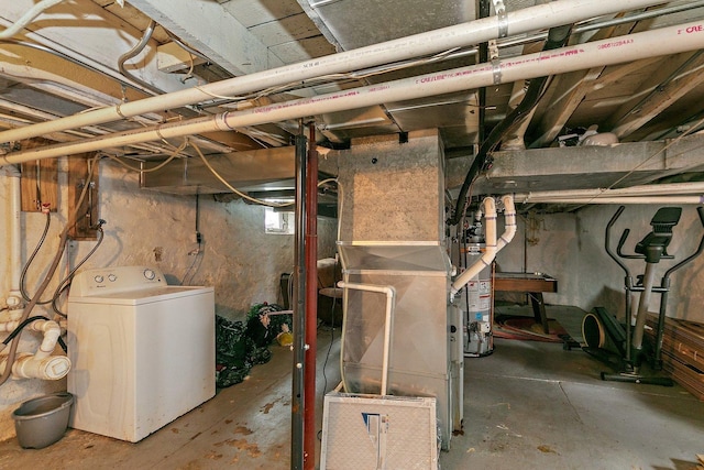 basement featuring washer / dryer and water heater