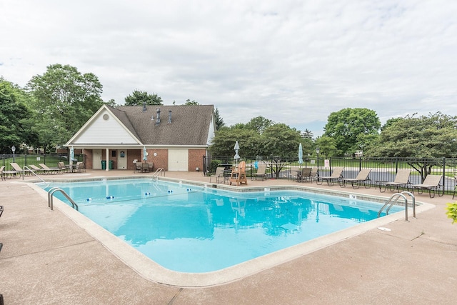 view of pool featuring a patio