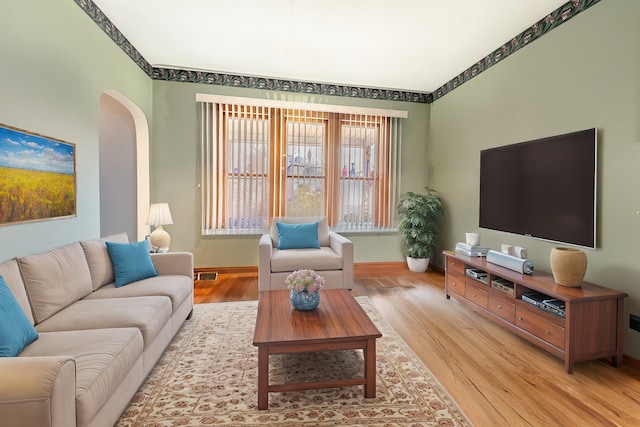 living room with light hardwood / wood-style floors