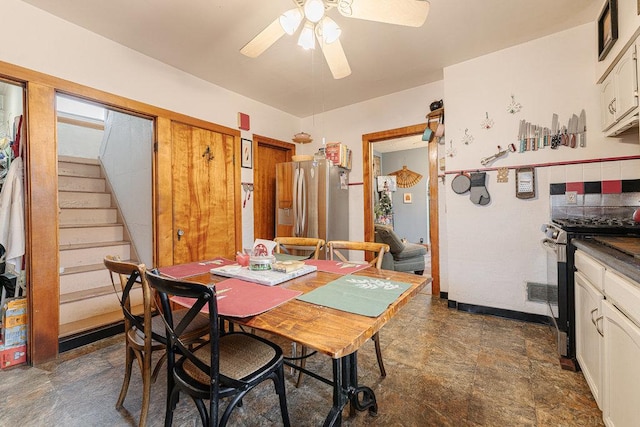 dining area with ceiling fan