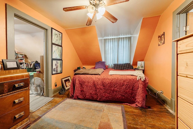 bedroom with wood-type flooring and ceiling fan