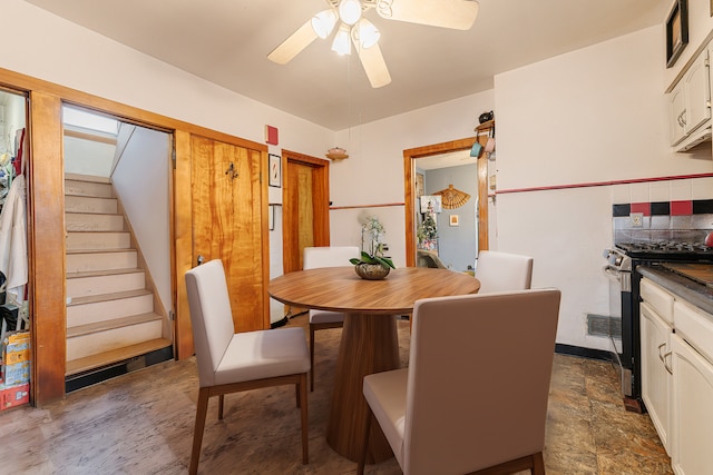 dining room with ceiling fan