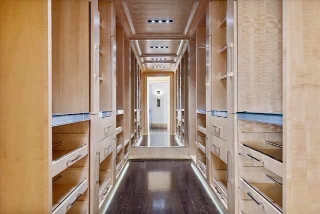 hallway featuring dark hardwood / wood-style flooring, wooden walls, and wooden ceiling