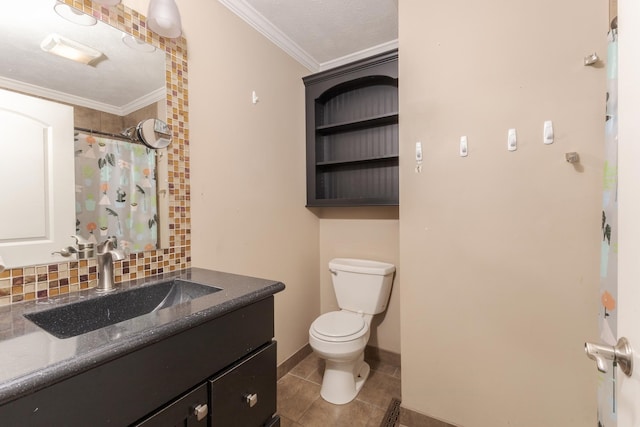 bathroom with tile patterned floors, crown molding, toilet, decorative backsplash, and vanity