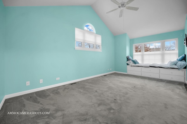 unfurnished bedroom featuring carpet flooring, ceiling fan, and lofted ceiling