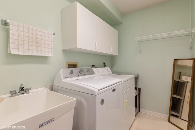 7041 W Touhy Ave Unit 209, Niles, IL 60714 - washroom with cabinet space and washer and clothes dryer