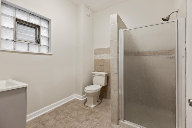 bathroom with toilet and walk in shower