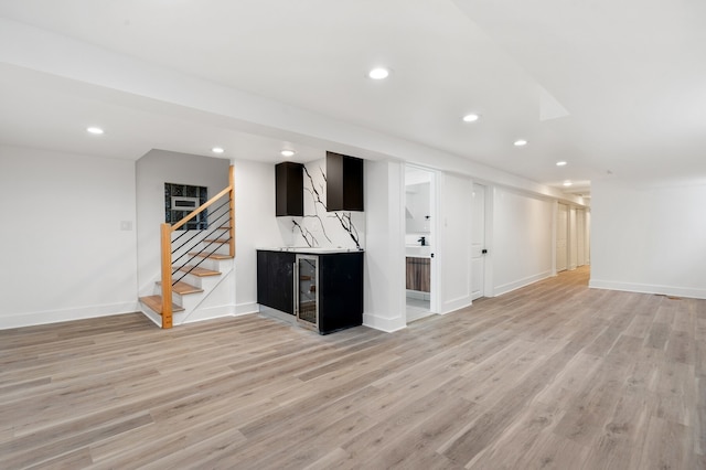 basement featuring light wood-type flooring