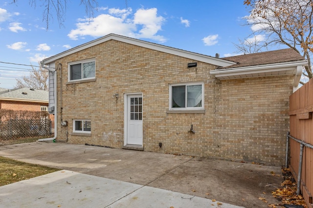 back of property with a patio area