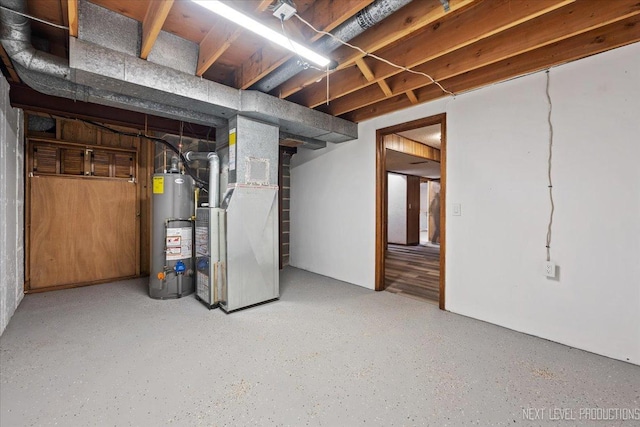 basement with heating unit and water heater